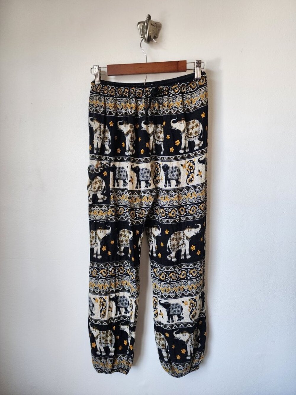 Earthbound Trading Co. black yellow elephant print pants M